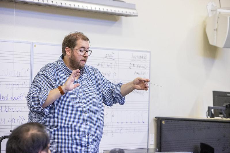 Ryan Heimlich directs the band. 